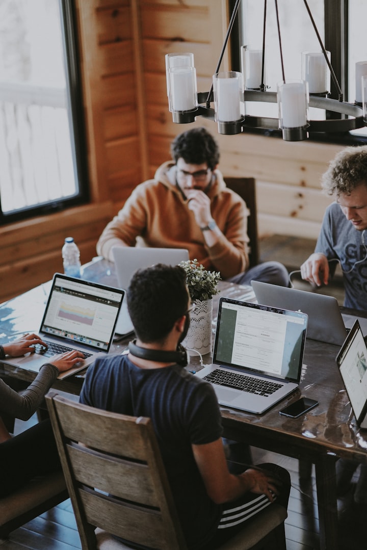 Travel advisors collaborating in a bright workspace